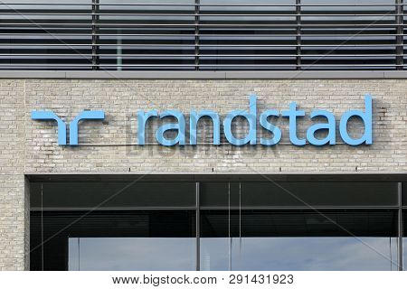 Tilst, Denmark - October 7, 2018: Randstad Logo On A Wall. Randstad Is A Dutch Multinational Human R