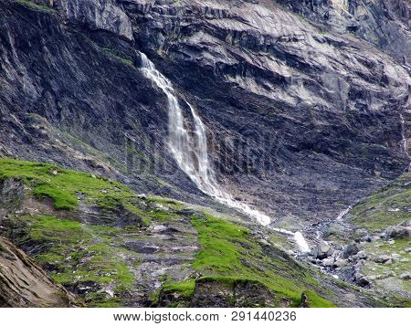 Nameless Waterfalls Under The Alpine Peaks Glarner Vorab And Bünder Vorab In The Valley Of Im Loch -