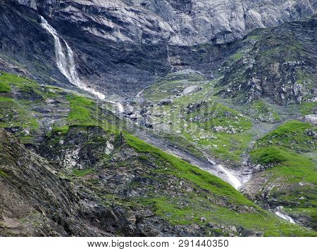Nameless Waterfalls Under The Alpine Peaks Glarner Vorab And Bünder Vorab In The Valley Of Im Loch -