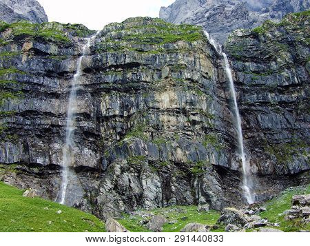 Nameless Waterfalls Under The Alpine Peaks Glarner Vorab And Bünder Vorab In The Valley Of Im Loch -
