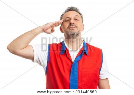 Serious Male Hypermarket Or Supermarket Employee Wearing Red And Blue Vest Touching Temple With Hand