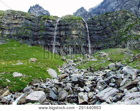 Nameless Waterfalls Under The Alpine Peaks Glarner Vorab And Bünder Vorab In The Valley Of Im Loch -