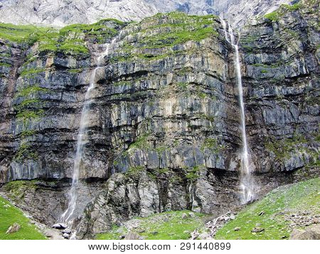 Nameless Waterfalls Under The Alpine Peaks Glarner Vorab And Bünder Vorab In The Valley Of Im Loch -