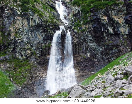 Nameless Waterfalls Under The Alpine Peaks Glarner Vorab And Bünder Vorab In The Valley Of Im Loch -