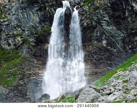 Nameless Waterfalls Under The Alpine Peaks Glarner Vorab And Bünder Vorab In The Valley Of Im Loch -