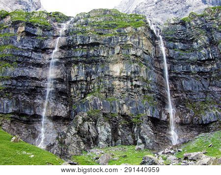 Nameless Waterfalls Under The Alpine Peaks Glarner Vorab And Bünder Vorab In The Valley Of Im Loch -