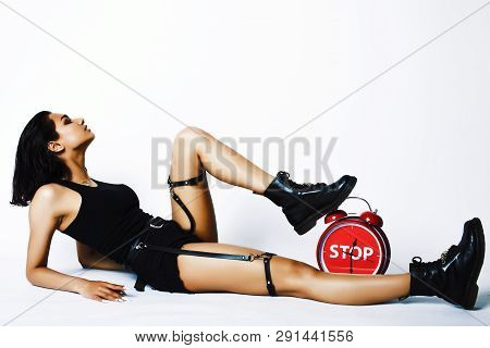 Young Pretty Indian Girl With Red Alarm Clock Posing Cheerful On White Background Isolated, Sexy Mod