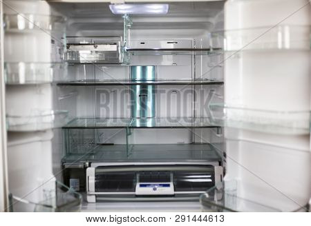 Shelves Of An Empty Refrigerator, Fridge With Freezer. Household Or. Kitchen Appliance For Food Cool