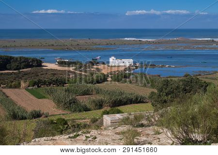 Rugged Coastline Of The Atlantic Ocean. Green Country And Small Islands. Horizon Of The Ocean. Blue 