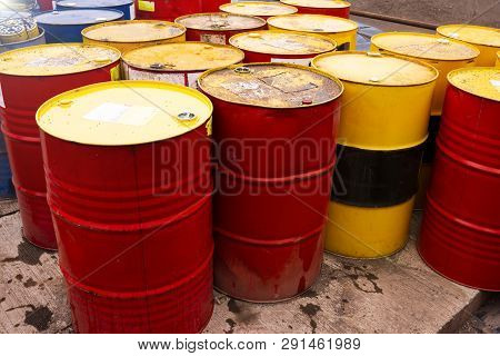Colored Metal Barrels. Blue Oil Drums Containing Fuel For Transportation