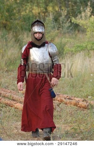 KIEV, UKRAINE - JULY 31: Member of history club Golden Capricorn wears medieval costume as he participates in historical festival and camp in memory of King Vladimir July 31, 2009 in Kiev, Ukraine.