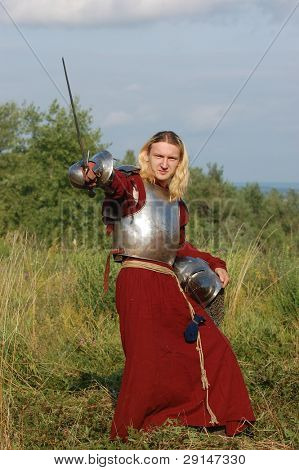 KIEV, UKRAINE - JULY 31: Member of history club Golden Capricorn wears medieval costume as he participates in historical festival and camp in memory of King Vladimir July 31, 2009 in Kiev, Ukraine.