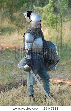 KIEV, UKRAINE - JULY 31: Member of history club Golden Capricorn wears medieval costume as he participates in historical festival and camp in memory of King Vladimir July 31, 2009 in Kiev, Ukraine.