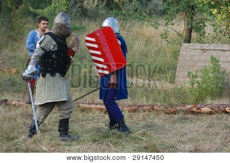 KIEV, UKRAINE - JULY 31: Member of history club Golden Capricorn wears medieval costume as he participates in historical festival and camp in memory of King Vladimir July 31, 2009 in Kiev, Ukraine.