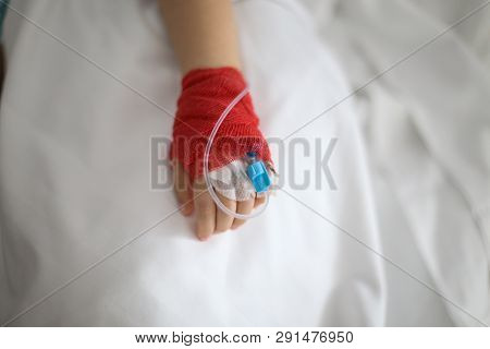 Details With A Cannula On The Hand Of A Ill Little Girl In A Pediatric Hospital Reserve