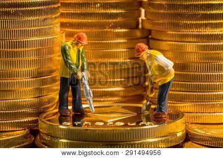 Concept Illustration Of Two Miners Mining New Ethereum Cybercurrency Virtual Coins In The Blockchain