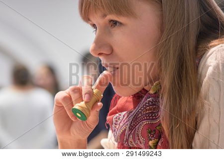 ST. PETERSBURG, RUSSIA - DECEMBER 29, 2018: Women Grandmaster Olga Girya, Russia competes in King Salman World Blitz Chess Championship 2018. Eventually she took 22nd place