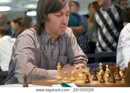 ST. PETERSBURG, RUSSIA - DECEMBER 28, 2018: Grandmaster Gata Kamsky, USA competes in King Salman World Rapid Chess Championship 2018. Eventually he took 22nd place