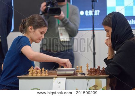 ST. PETERSBURG, RUSSIA - DECEMBER 30, 2018: Match Anastasia Bodnaruk, Russia (left) vs Sarasadat Khademalsharieh, Iran during World Blitz Chess Championship 2018. Khademalsharieh won the match