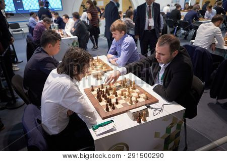 ST. PETERSBURG, RUSSIA - DECEMBER 27, 2018: Men compete in King Salman World Rapid Chess Championship 2018. In front Shakhriyar Mamedyarov, Azerbaijan (right) vs Gigoriy Oparin, Russia