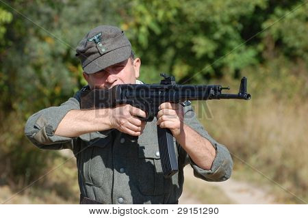 KIEV, UKRAINE - SEPT 19, : Member of a history club wear historical German uniforms as he participates in a WWII reenactment.Buttle for Kiev in 1943. September 19 , 2009 in Kiev, Ukraine