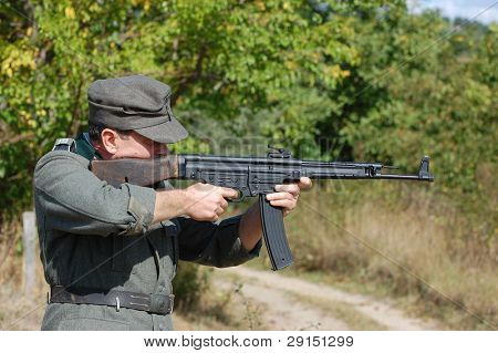 KIEV, UKRAINE - SEPT 19, : Member of a history club wear historical German uniforms as he participates in a WWII reenactment.Buttle for Kiev in 1943. September 19 , 2009 in Kiev, Ukraine