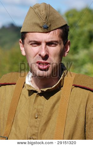 KIEV, UKRAINE - SEPT 19, : Member of a history club wear historical Soviet  uniforms as he participates in a WWII reenactment.Buttle for Kiev in 1943. September 19 , 2009 in Kiev, Ukraine