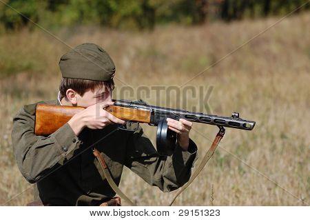 KIEV, UKRAINE - SEPT 19, : Member of a history club wear historical Soviet  uniforms as he participates in a WWII reenactment.Buttle for Kiev in 1943. September 19 , 2009 in Kiev, Ukraine