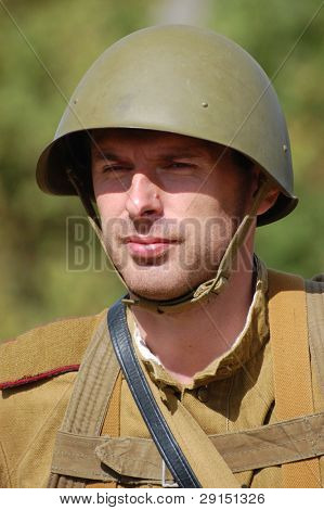 KIEV, UKRAINE - SEPT 19, : Member of a history club wear historical Soviet  uniforms as he participates in a WWII reenactment.Buttle for Kiev in 1943. September 19 , 2009 in Kiev, Ukraine