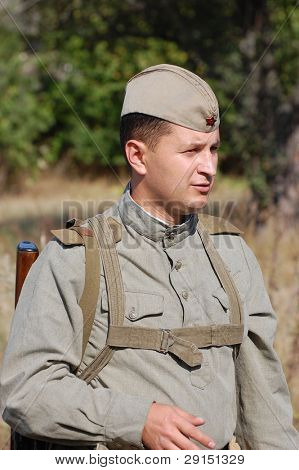 KIEV, UKRAINE - SEPT 19, : Member of a history club wear historical Soviet  uniforms as he participates in a WWII reenactment.Buttle for Kiev in 1943. September 19 , 2009 in Kiev, Ukraine