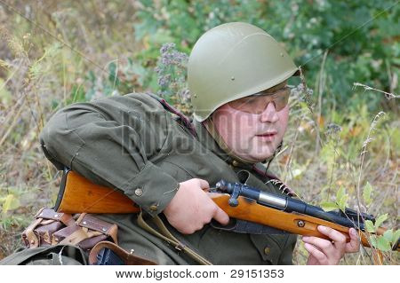 KIEV, UKRAINE - SEPT 19, : Member of a history club wear historical Soviet  uniforms as he participates in a WWII reenactment.Buttle for Kiev in 1943. September 19 , 2009 in Kiev, Ukraine