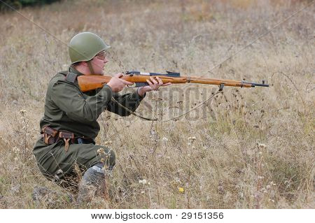 KIEV, UKRAINE - SEPT 19, : Member of a history club wear historical Soviet  uniforms as he participates in a WWII reenactment.Buttle for Kiev in 1943. September 19 , 2009 in Kiev, Ukraine
