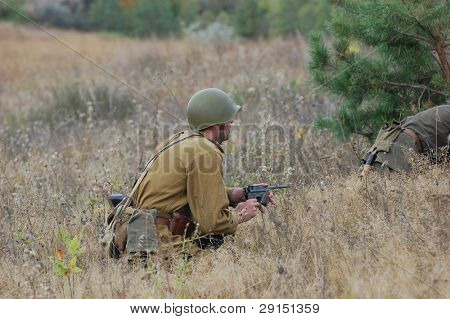 KIEV, UKRAINE - SEPT 19, : Member of a history club wear historical Soviet  uniforms as he participates in a WWII reenactment.Buttle for Kiev in 1943. September 19 , 2009 in Kiev, Ukraine