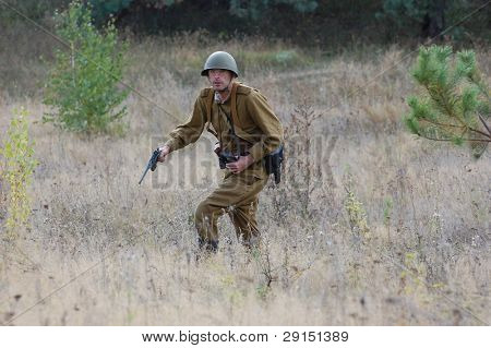 KIEV, UKRAINE - SEPT 19, : Member of a history club wear historical Soviet  uniforms as he participates in a WWII reenactment.Buttle for Kiev in 1943. September 19 , 2009 in Kiev, Ukraine