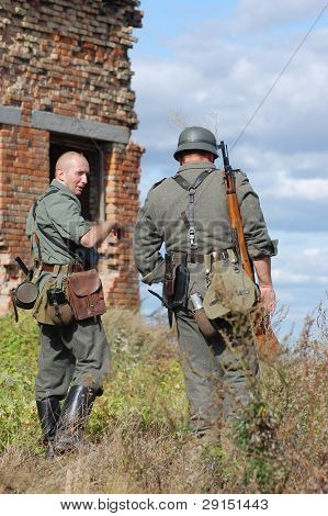 KIEV, UKRAINE - SEPT 19, : Members of a history club wear historical German uniforms as they participates in a WWII reenactment.Buttle for Kiev in 1943. September 19 , 2009 in Kiev, Ukraine