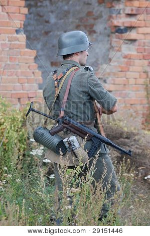 KIEV, UKRAINE - SEPT 19, : Member of a history club wear historical German uniforms as he participates in a WWII reenactment.Buttle for Kiev in 1943. September 19 , 2009 in Kiev, Ukraine
