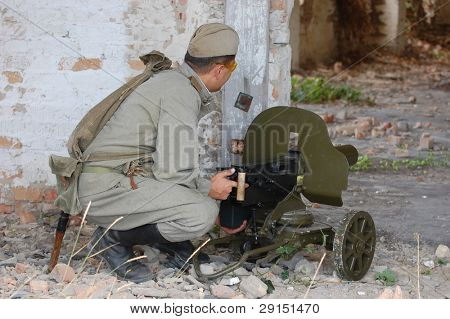 KIEV, UKRAINE - SEPT 19, : Member of a history club wear historical Soviet  uniforms as he participates in a WWII reenactment.Buttle for Kiev in 1943. September 19 , 2009 in Kiev, Ukraine