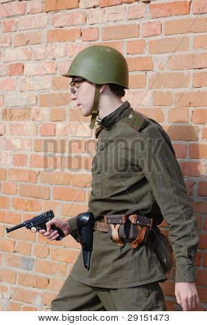 KIEV, UKRAINE - SEPT 19, : Member of a history club wear historical Soviet  uniforms as he participates in a WWII reenactment.Buttle for Kiev in 1943. September 19 , 2009 in Kiev, Ukraine