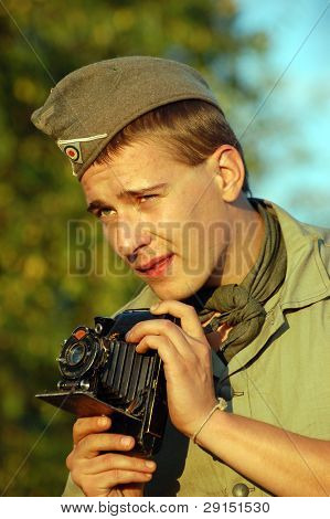KIEV, UKRAINE - SEPT 19, : Member of a history club wear historical German uniforms as he participates in a WWII reenactment.Buttle for Kiev in 1943. September 19 , 2009 in Kiev, Ukraine