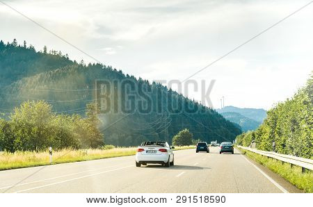 Schiltach, Germany - Jun 10, 2018: German Highway With Luxury Audi Convertible Cabriolet Car Driving