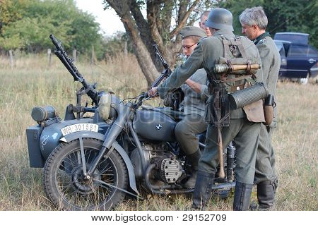 KIEV, UKRAINE - SEPT 19, : Members of a history club wear historical German uniforms as they participates in a WWII reenactment.Buttle for Kiev in 1943. September 19 , 2009 in Kiev, Ukraine