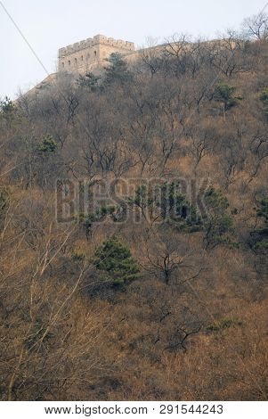 Great Wall on top of the hill in Badaling near Bejing. Autumn season.