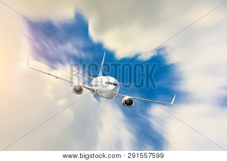 Modern Airplane Mith Motion Blur Effect Travel Clouds At Sunny Bright Day