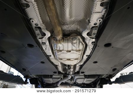Technical Photo. The Structure Of The Modern Car. The Bottom Of The Car, Protective Covers, Noise In