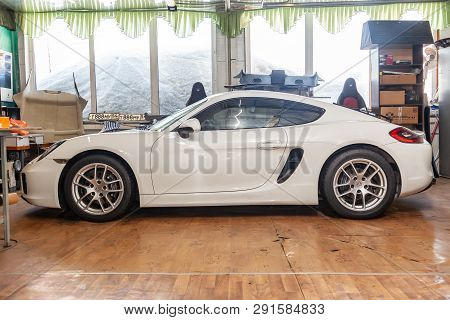 Novosibirsk, Russia - 08.01.18: Side View Of Luxury Very Expensive New White Porsche Cayman Coupe Sp