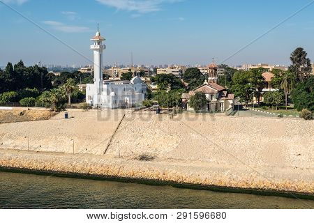 Ismailia, Egypt - November 5, 2017: El Shefaa Mosque And Ajat Church On The Shore Of Suez Canal In I