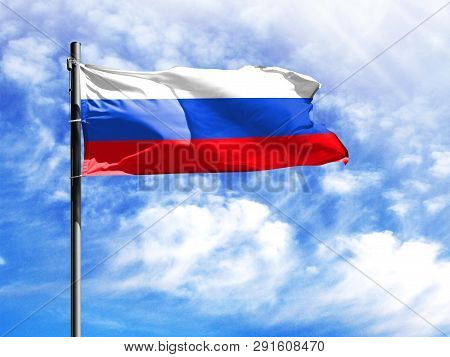 National Flag Of Russia On A Flagpole In Front Of Blue Sky.