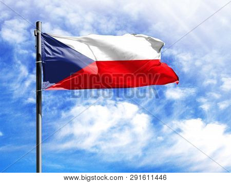 National Flag Of Czech Republic On A Flagpole In Front Of Blue Sky.