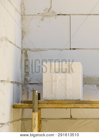 Details Of House Home Construction Site. Provisional Walls Made Of Grey Blocks.