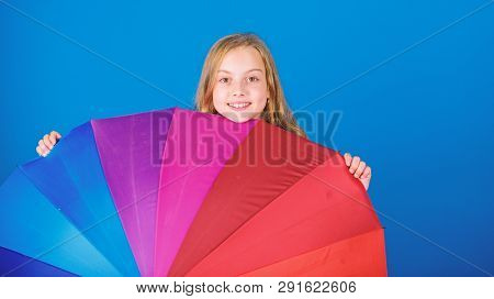 Brighten Up Life. Kid Peek Out Colorful Rainbow Umbrella. Color Your Life. Girl Cheerful Hide Behind